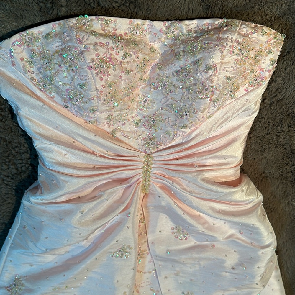 Pink strapless full length gown with rhinestones all over